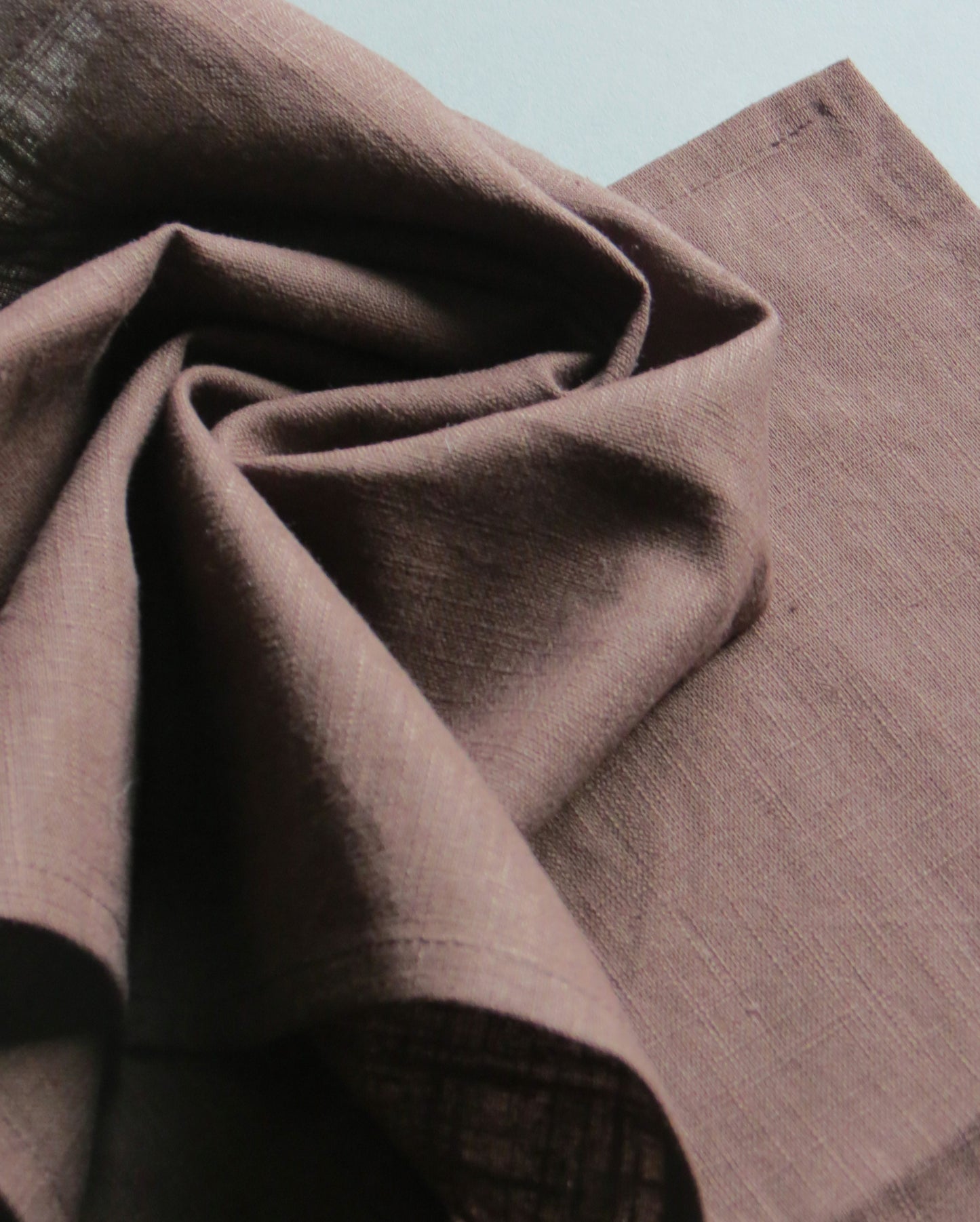 Close-up of brown fabric with a textured surface
